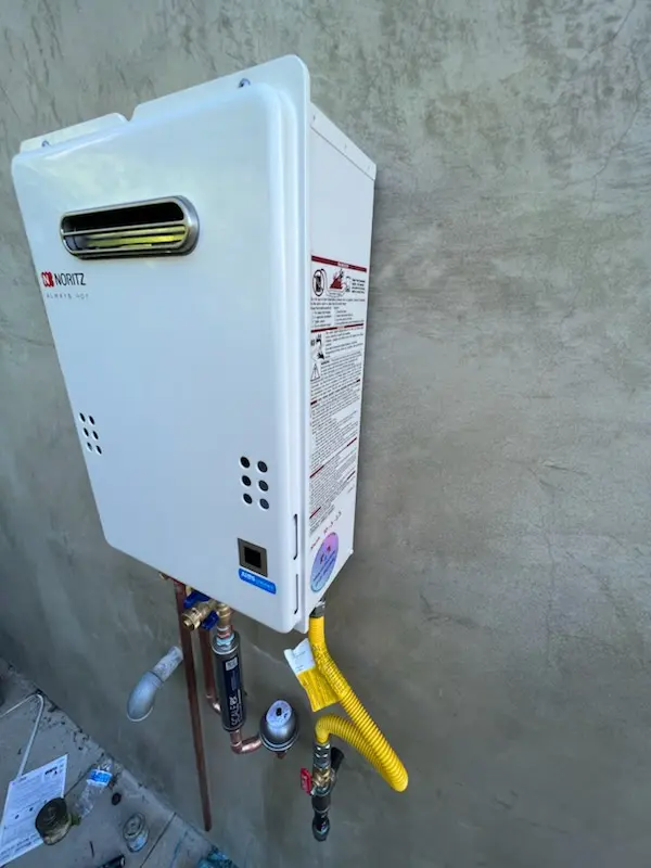 Tankless water heater installation for Socialville homes